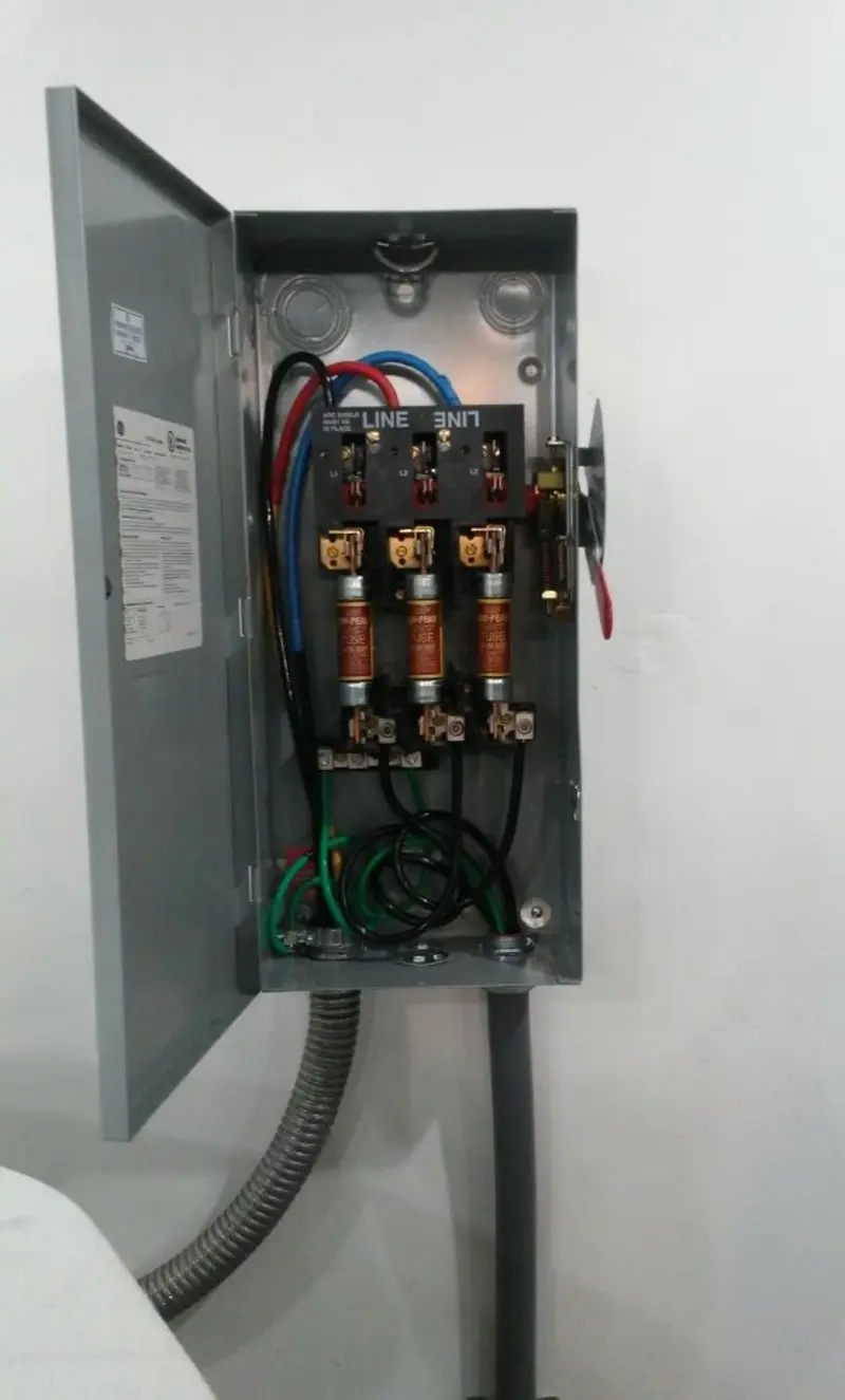 Three-phase disconnect switch installed for Smoke Detector Installation in Riviera Beach